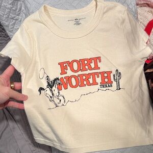 Brandy Melville Cream Graphic Tee with Orange 'Fort Worth' Print